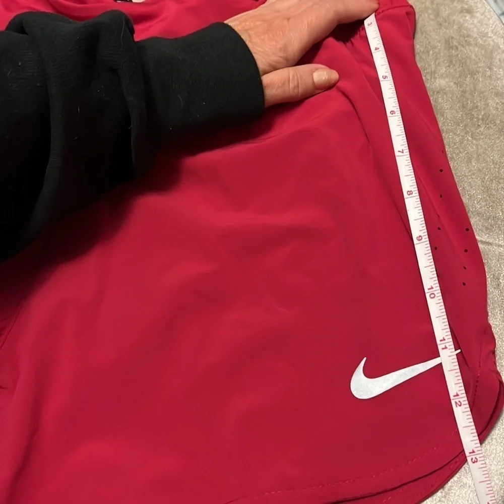 Nike raspberry colored Dri-Fit running shorts, medium, new